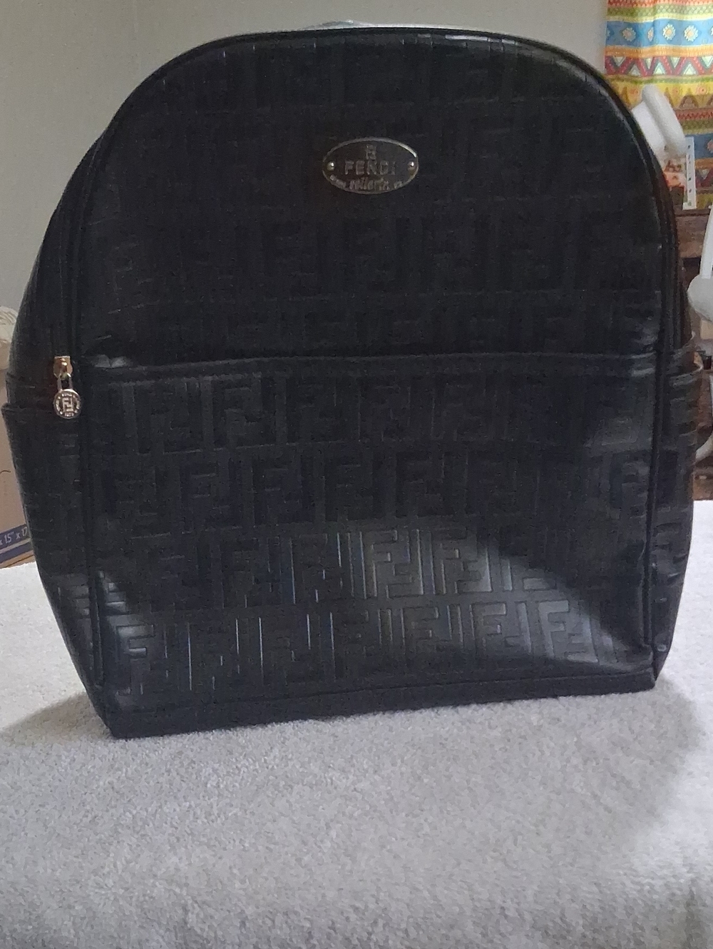Fendi Black Embossed FF Logo Backpack with Gold Accents